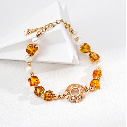 Natural pearl, zircon, and amber bracelet
