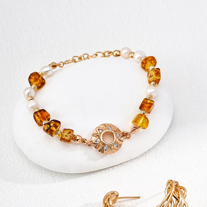 Natural pearl, zircon, and amber bracelet