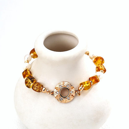 Natural pearl, zircon, and amber bracelet